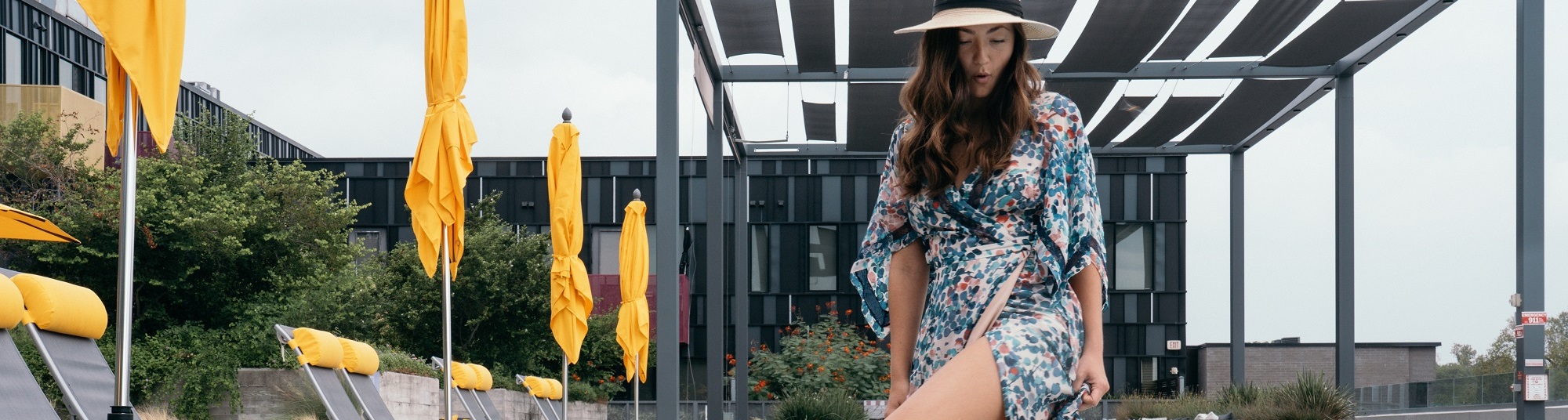 Woman kicking water inside of the pool